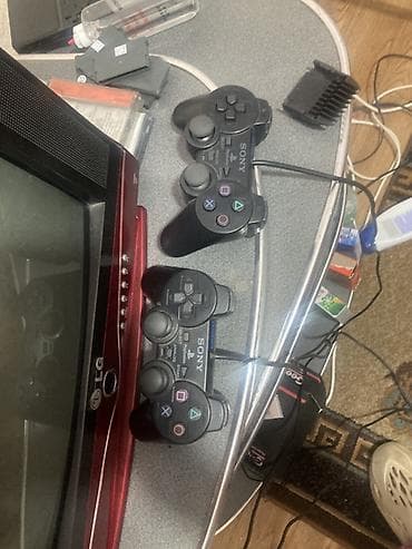 Игровая приставка Sony PlayStation 2 Slim (серебристая). Прошитая — 3