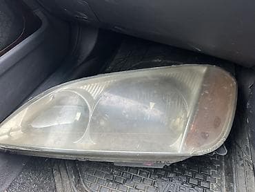 Передняя левая фара Mitsubishi