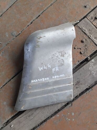 запчасти на мицубиси паджеро 2: Mitsubishi Pajero W44 Накладка пластиковая на бампер, Митсубиси — 1