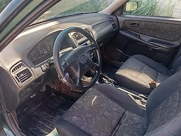 макси скутера: Mazda 626: 1999 г., 1.8 л, Механика, Бензин, Универсал — 6