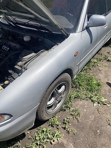 Продажа авто: Mazda 323: 1999 г., Механика, Бензин, Седан — 2