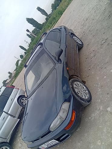 машиа: Toyota Corolla: 1995 г., Механика, Бензин, Универсал — 9