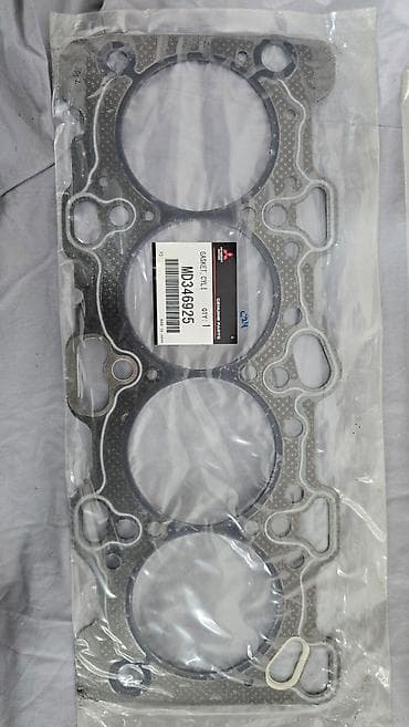Натяжитель Mitsubishi Новый