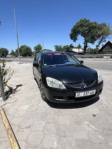 byd leopard 5: Mitsubishi Lancer: 2003 г., 1.6 л, Автомат, Бензин, Универсал — 4