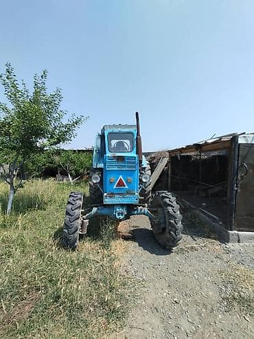 трактор т70: Трактор колесный, с кабиной, голубого цвета. Характеристики и — 9