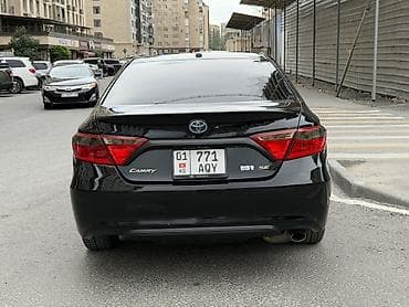 byd e7: Toyota Camry: 2015 г., 2.5 л, Автомат, Гибрид, Седан — 4