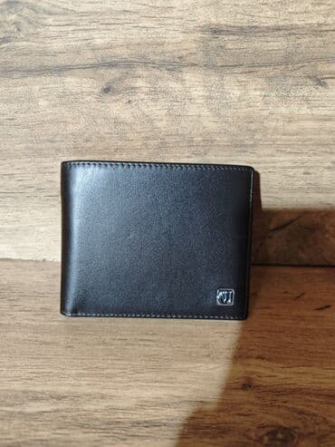 найден кошелек: Портмоне 
Натуральная кожа — 1