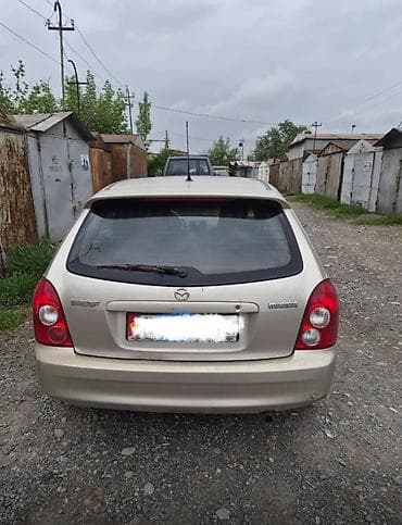 lada 2105: Mazda Familia: 2002 г., 1.3 л, Механика, Бензин, Универсал — 2