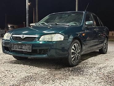 е34 люк: Mazda 323: 2000 г., 1.3 л, Механика, Бензин, Седан — 2