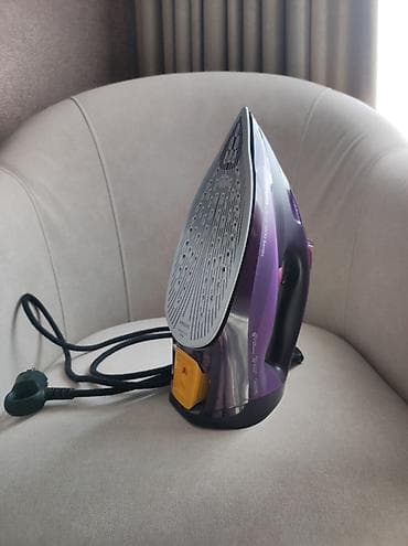 Уход за одеждой: Утюг Philips DST7061 Характеристики: Постоянная подача пара: 55 г/мин — 5