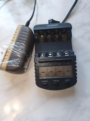 кандер: 1. Умное зарядное устройство LiitoKala Lii-CH4 Новая. Цена 1500 с — 5