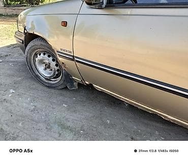 Автомобиль седан, бензиновый, передний привод. Характеристики и