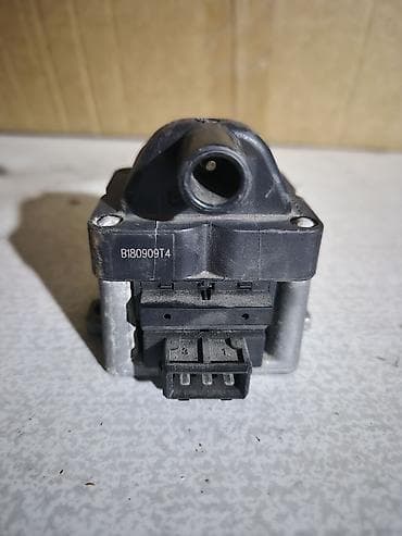 карбюратор 09: Катушка зажигания Volkswagen 2009 г., Б/у, Оригинал, Германия — 1