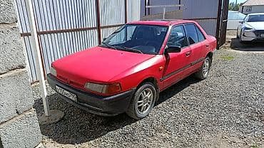 Продажа авто: Mazda 323: 1992 г., 1.3 л, Механика, Бензин, Седан — 3