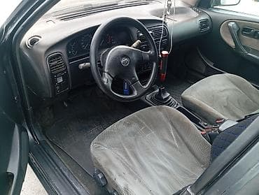 cdi 2 7: Nissan Primera: 1991 г., 2 л, Механика, Бензин, Седан — 5