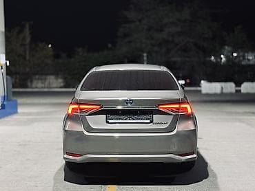 byd e2 2021: Toyota Corolla: 2020 г., 1.8 л, Автомат, Гибрид, Седан — 4