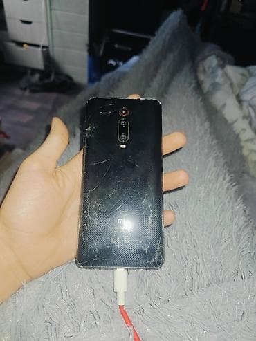 ниже: Xiaomi, Mi 9T, цвет - Черный — 1