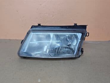 Передняя левая фара Volkswagen 1997 г., Б/у, Оригинал, Германия