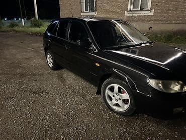 салон жасайбыз: Mazda 323: 2001 г., 1.6 л, Кол менен иштөөчү, Хетчбек — 5
