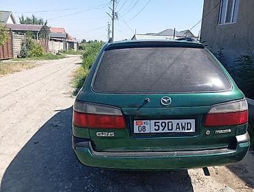 макси скутера: Mazda 626: 1999 г., 1.8 л, Механика, Бензин, Универсал — 3