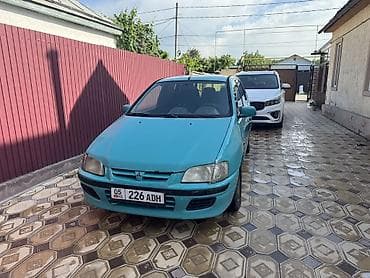 чехли: Mitsubishi Space Star: 1999 г., Механика, Бензин, Хэтчбэк — 1
