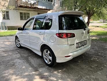 Mazda Demio: 2003 г., 1.5 л, Типтроник, Бензин, Хетчбек — 10