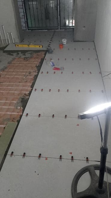 Электриктер: Укладка крупноформатной керамогранитной плитки в ванных комнатах и — 3