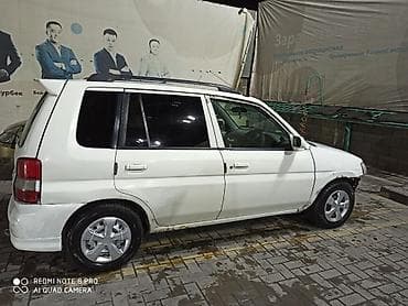 тачки б у: Mazda Demio: 1999 г., 1.4 л, Автомат, Бензин, Минивэн — 3