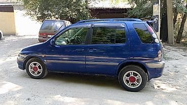тарзан машина: Toyota Raum: 2000 г., 1.3 л, Автомат, Бензин, Минивэн — 4
