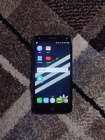 p 10: Alcatel Pop 4 (Серый) Телефон компактный, удобно лежит в руке — 2