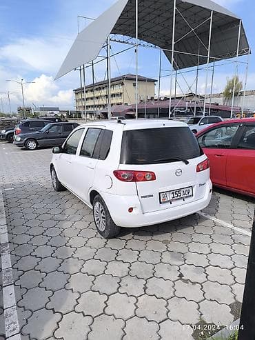 Mazda Demio: 2005 г., 1.5 л, Автомат, Бензин