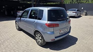с доплатой мне: Mazda Demio: 2004 г., 1.3 л, Бензин — 4