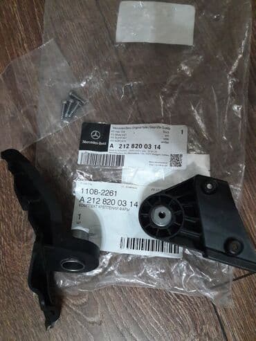 крепление для номера: Передняя левая фара Mercedes-Benz 2010 г., Новый, Оригинал — 1