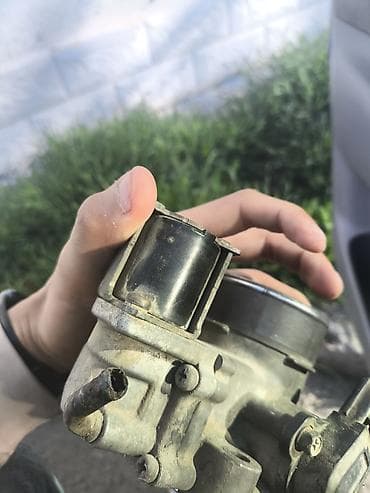 глушитель тюнинг: Дроссельная заслонка Mazda 2002 г., Б/у, Оригинал — 1