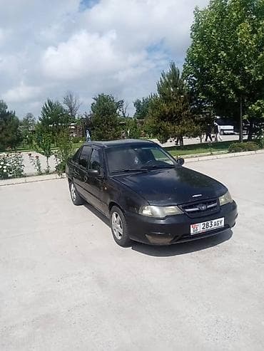 2011: Daewoo Nexia: 2011 г., Механика, Бензин, Седан — 4