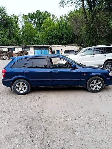 продаю с: Mazda 323: 2001 г., 1.6 л, Автомат, Бензин, Универсал — 4