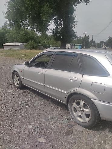 киргизские сайты авто: Mazda 323: 2002 г., 1.6 л, Механика, Бензин — 4