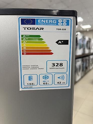 tcl qled 55: Холодильник TOEAR TOR-220, серебристый, с верхней морозильной камерой — 2