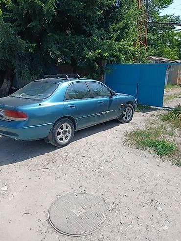 мереке авто слив: Mazda Cronos: 1993 г., 2 л, Автомат, Бензин, Седан — 5