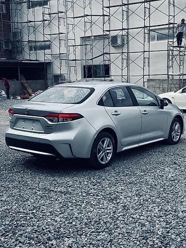 рага авто: Toyota Corolla: 2021 г., 1.8 л, Вариатор, Гибрид, Седан — 4