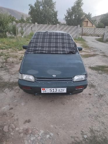 Nissan Prairie: 1994 г. — 1
