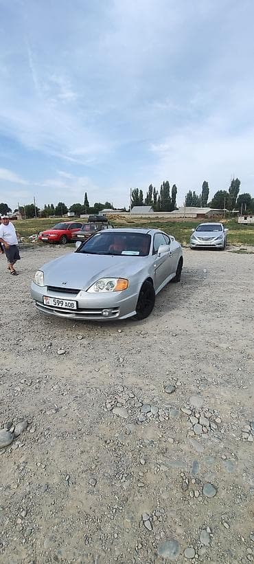 tuscani: Hyundai Tuscani: 2002 г., 2 л, Механика, Бензин, Купе — 9
