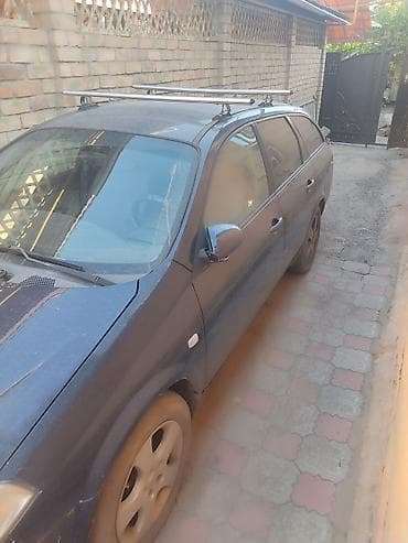 Nissan Primera: 2003 г., 1.8 л, Механика, Бензин, Универсал — 2
