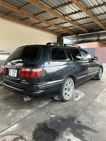 2 куб: Toyota Carina E: 1997 г., 1.8 л, Механика, Бензин, Универсал — 4