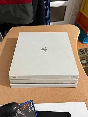 плайстейшен 4: Игровая консоль PlayStation 4 Pro (белая) Комплектация: - Консоль PS4 — 2