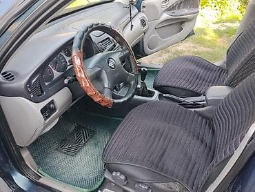айни 95: Nissan Almera: 2000 г., 1.8 л, Механика, Бензин, Хэтчбэк — 2