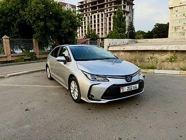 byd e2 2023: Toyota Corolla: 2023 г., 1.8 л, Вариатор, Гибрид, Седан — 2