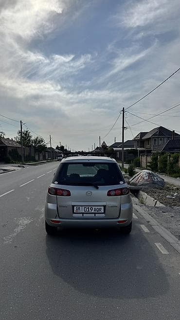 Mazda Demio: 2004 г., 1.5 л, Автомат, Бензин, Хэтчбэк — 5