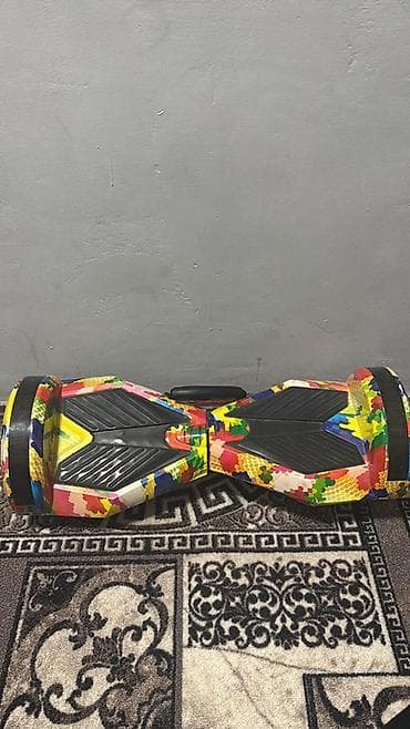 гераскутеры: Гироскутер с ярким многоцветным принтом. Особенности: - Диаметр — 1