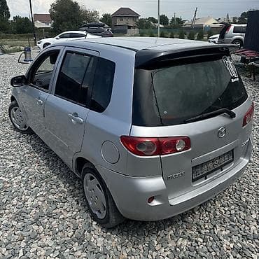second tech: Mazda Demio: 2004 г., 1.3 л, Автомат, Газ, Хэтчбэк — 2